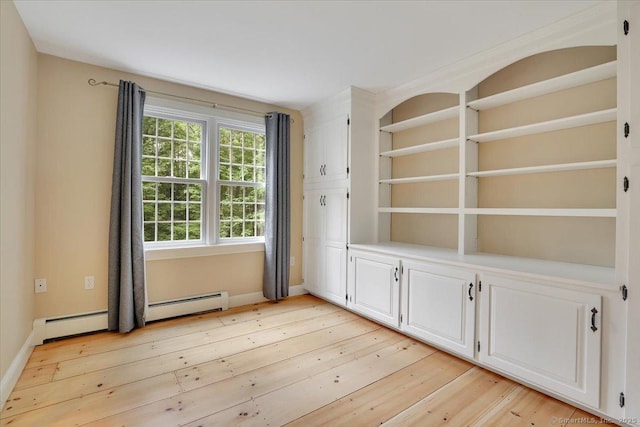 47 Cricket Ln, Somers, CT 06071 - unfurnished room with light wood-type flooring, a baseboard radiator, and baseboards