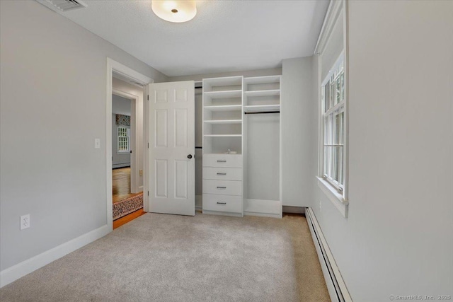 47 Cricket Ln, Somers, CT 06071 - walk in closet featuring light carpet and baseboard heating