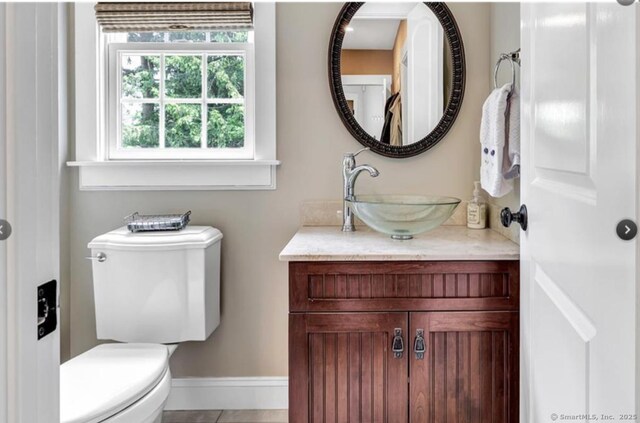 57 Church St, Shelton, CT 06484 - bathroom featuring toilet and vanity