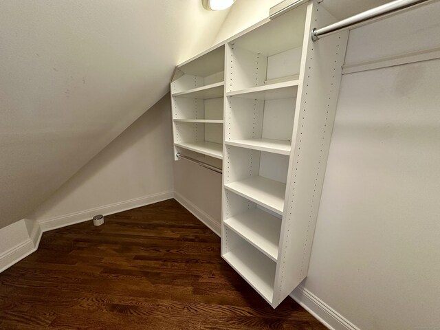57 Church St, Shelton, CT 06484 - walk in closet with vaulted ceiling and dark wood finished floors