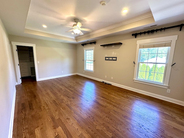 57 Church St, Shelton, CT 06484 - empty room with crown molding, a tray ceiling, ceiling fan, a smoke detector, and dark wood-style flooring