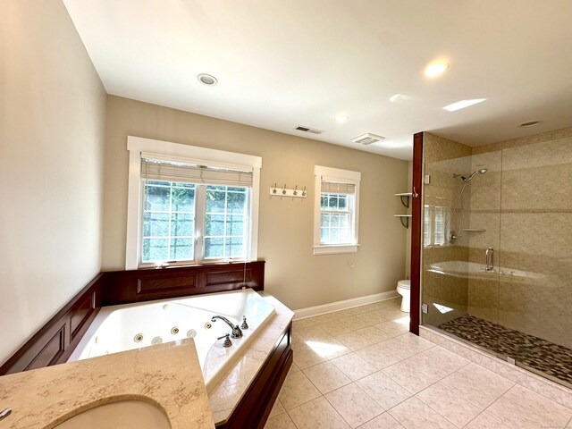 57 Church St, Shelton, CT 06484 - bathroom with a tub with jets, a shower stall, tile patterned flooring, and recessed lighting