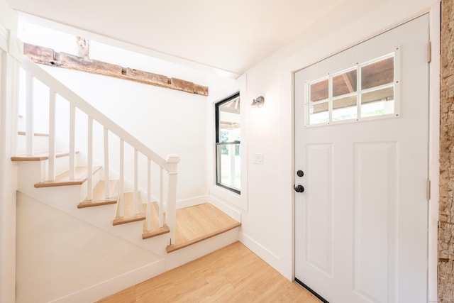 219 Redding Rd, Redding, CT 06896 - foyer with wood finished floors and stairs