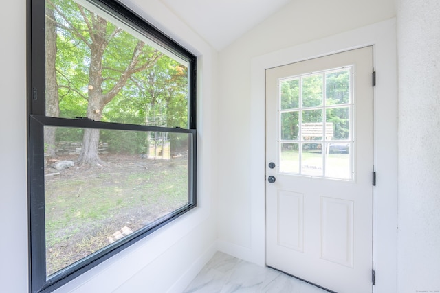 219 Redding Rd, Redding, CT 06896 - doorway with healthy amount of natural light, vaulted ceiling, and light marble finish flooring