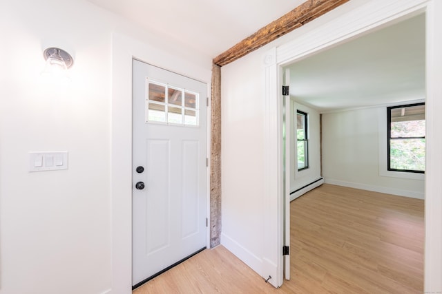 219 Redding Rd, Redding, CT 06896 - foyer with a baseboard radiator and light wood finished floors