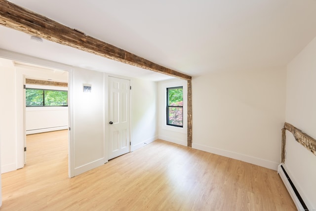 219 Redding Rd, Redding, CT 06896 - unfurnished room featuring a baseboard radiator, light wood-type flooring, healthy amount of natural light, and beamed ceiling