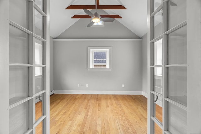 75 Harrison Ave, Wallingford, CT 06492 - empty room with ceiling fan, vaulted ceiling, wood finished floors, and a baseboard radiator