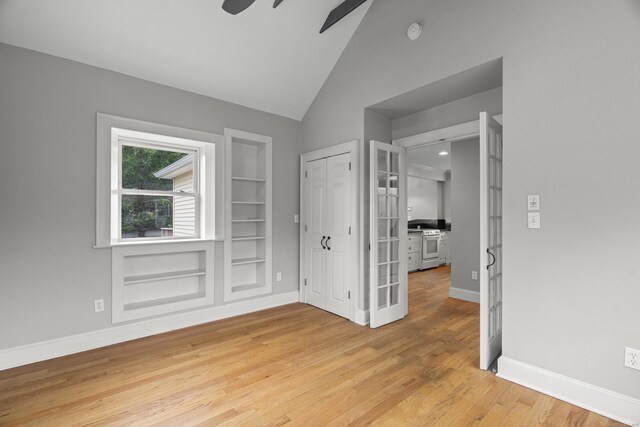 75 Harrison Ave, Wallingford, CT 06492 - unfurnished bedroom featuring vaulted ceiling, light wood-style floors, and a ceiling fan