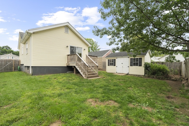 75 Harrison Ave, Wallingford, CT 06492 - rear view of property featuring a fenced backyard and an outdoor structure