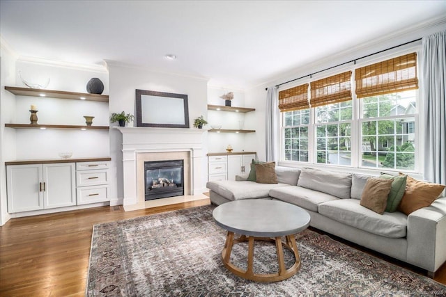 22 Woods Way Unit 22, Redding, CT 06896 - living room with wood finished floors, a fireplace with flush hearth, and crown molding