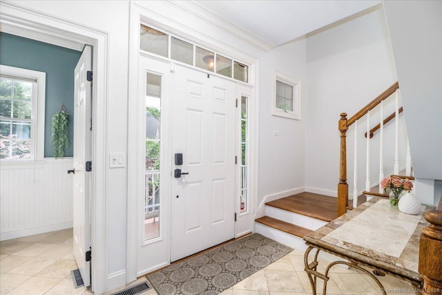 22 Woods Way Unit 22, Redding, CT 06896 - foyer entrance with stairway, light tile patterned floors, and wainscoting