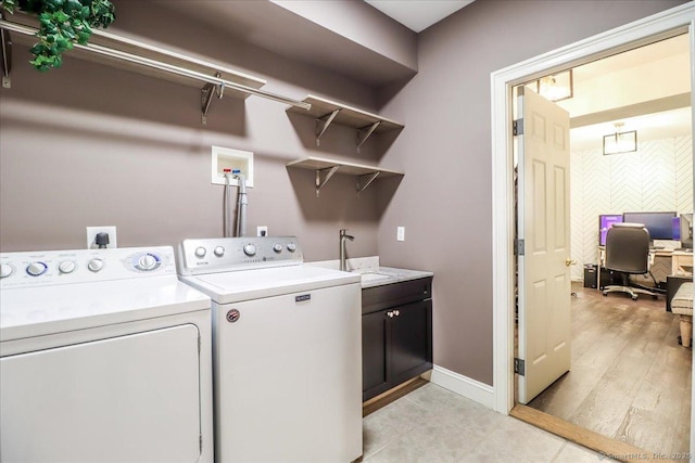 22 Woods Way Unit 22, Redding, CT 06896 - washroom featuring washing machine and dryer, cabinet space, a desk, and light tile patterned floors