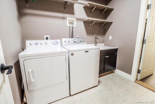 22 Woods Way Unit 22, Redding, CT 06896 - washroom with washing machine and dryer, cabinet space, and light tile patterned floors