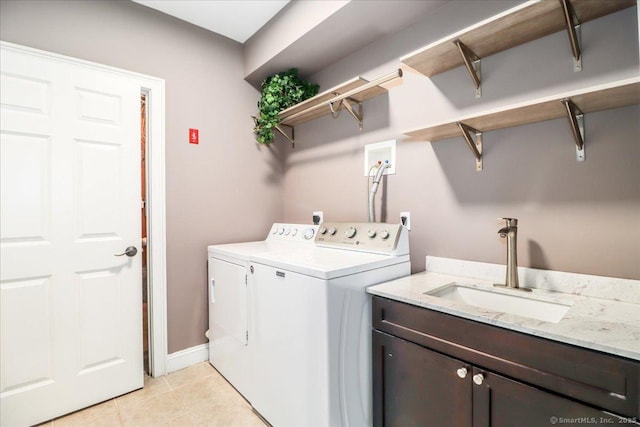 22 Woods Way Unit 22, Redding, CT 06896 - laundry area featuring independent washer and dryer, cabinet space, and light tile patterned floors