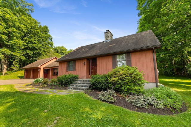 389 Chamberlain Rd, Middletown, CT 06457 - view of front of house featuring a chimney and a front yard