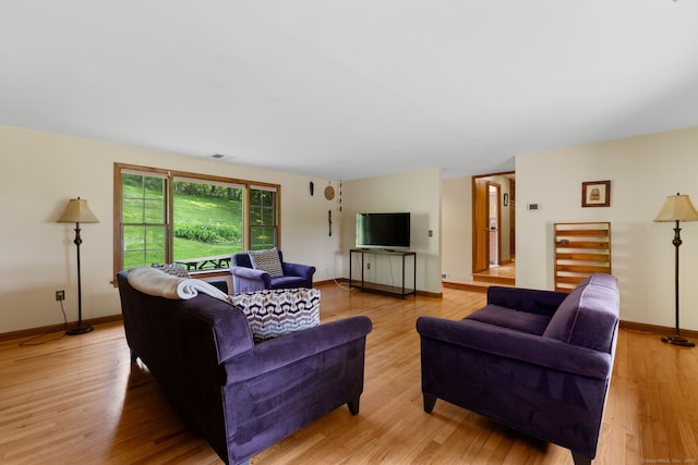 389 Chamberlain Rd, Middletown, CT 06457 - living room featuring light wood-style flooring and baseboards