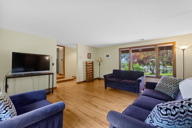 389 Chamberlain Rd, Middletown, CT 06457 - living room with light wood-style flooring and baseboards
