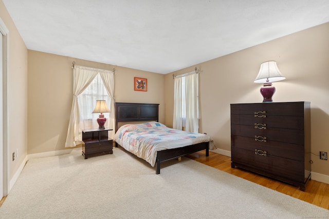 389 Chamberlain Rd, Middletown, CT 06457 - bedroom featuring baseboards and wood finished floors