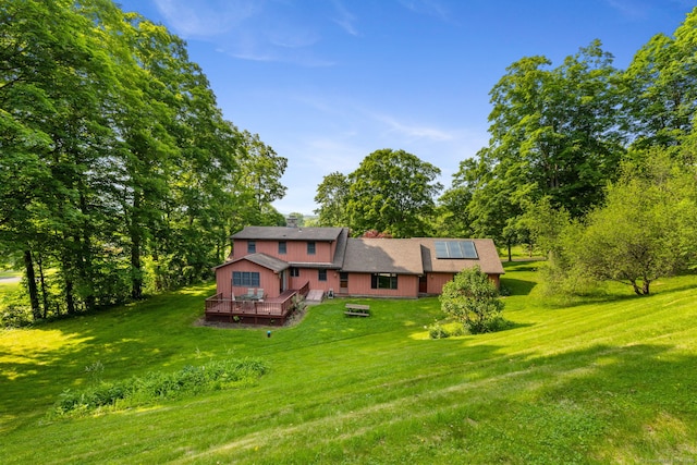 389 Chamberlain Rd, Middletown, CT 06457 - view of front of property featuring solar panels, a deck, and a front yard