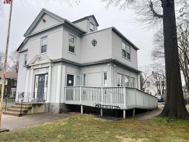 670 Clinton Ave, Bridgeport, CT 06605 - view of front of house featuring a wooden deck