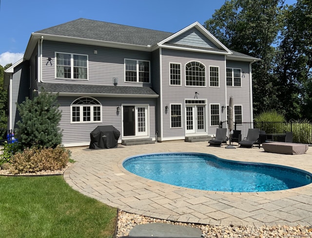 110 Laurelwood Dr, Southington, CT 06479 - back of house with a patio area and roof with shingles