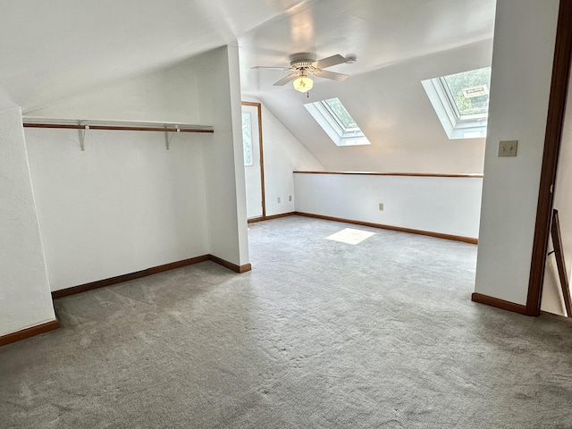 846 Sawmill Rd, West Haven, CT 06516 - bonus room featuring a skylight, carpet flooring, vaulted ceiling, and ceiling fan