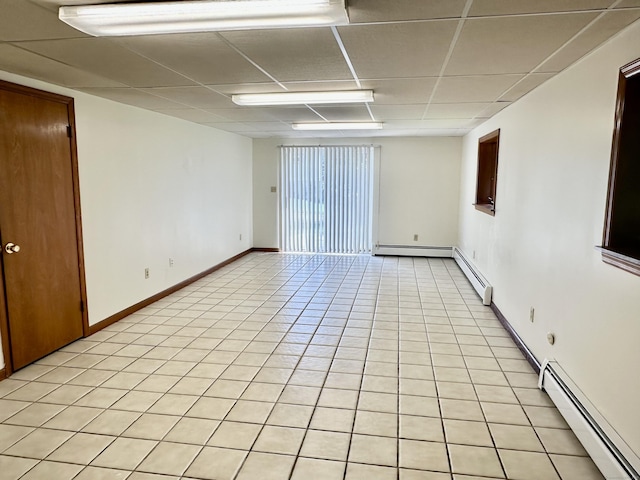 846 Sawmill Rd, West Haven, CT 06516 - empty room featuring baseboard heating, a drop ceiling, and light tile patterned floors