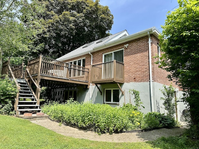 846 Sawmill Rd, West Haven, CT 06516 - back of property featuring a wooden deck, brick siding, stairs, and stucco siding