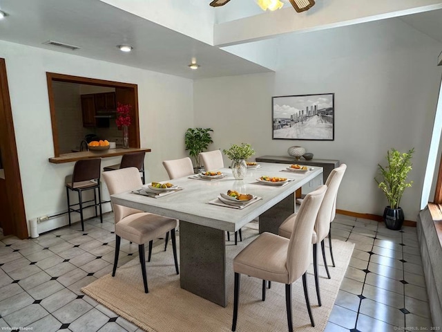 846 Sawmill Rd, West Haven, CT 06516 - dining room featuring a baseboard radiator and a ceiling fan