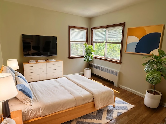 846 Sawmill Rd, West Haven, CT 06516 - bedroom with radiator heating unit and wood finished floors