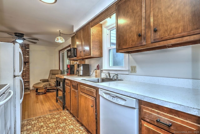17 Brush Hill Rd, Clinton, CT 06413 - kitchen featuring white appliances, ceiling fan, light countertops, and brown cabinetry