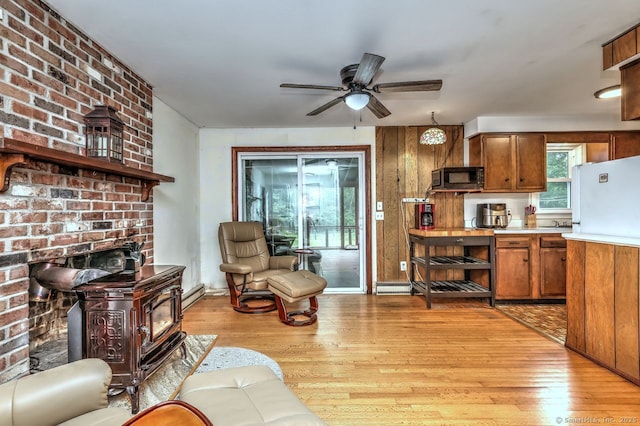 17 Brush Hill Rd, Clinton, CT 06413 - living room featuring a ceiling fan, light wood-style floors, and baseboard heating