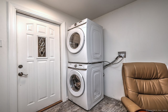 17 Brush Hill Rd, Clinton, CT 06413 - laundry area with stacked washer / drying machine and dark wood-style flooring