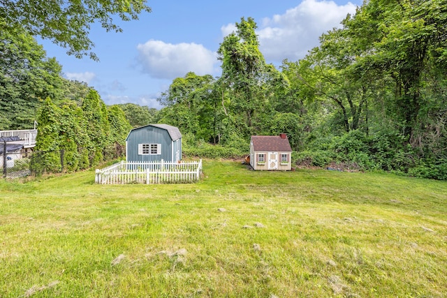1 Brook Hill Rd, Hamden, CT 06514 - view of yard with a storage unit and a forest view