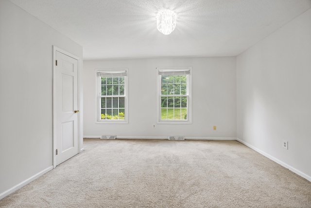 1 Brook Hill Rd, Hamden, CT 06514 - carpeted empty room featuring baseboards and a textured ceiling