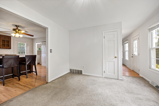 1 Brook Hill Rd, Hamden, CT 06514 - living room featuring light carpet and ceiling fan