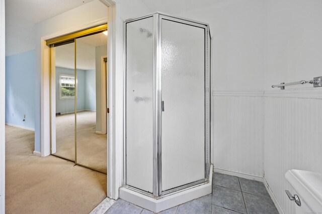 1 Brook Hill Rd, Hamden, CT 06514 - bathroom featuring a stall shower and wainscoting