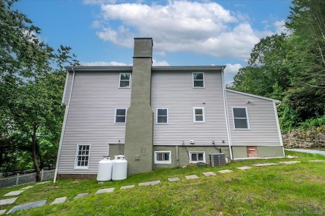 3 Brookside Trl, Monroe, CT 06468 - rear view of property featuring a chimney