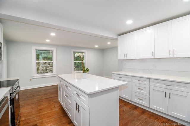 3 Brookside Trl, Monroe, CT 06468 - kitchen with stainless steel electric range, white cabinets, dark wood finished floors, a center island, and recessed lighting