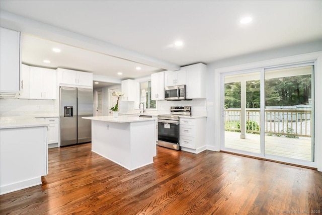 3 Brookside Trl, Monroe, CT 06468 - kitchen featuring appliances with stainless steel finishes, healthy amount of natural light, light countertops, white cabinetry, and recessed lighting