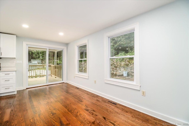 3 Brookside Trl, Monroe, CT 06468 - unfurnished dining area featuring dark wood-type flooring and recessed lighting