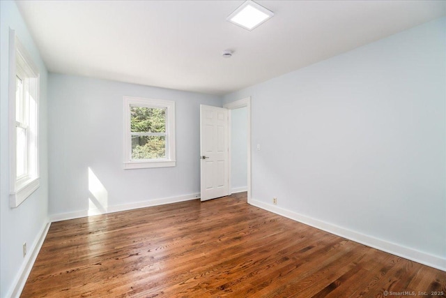 3 Brookside Trl, Monroe, CT 06468 - empty room featuring wood finished floors and baseboards