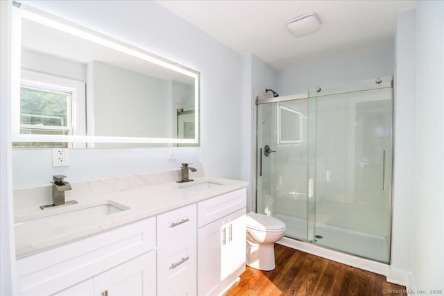 3 Brookside Trl, Monroe, CT 06468 - full bathroom featuring a stall shower, double vanity, and wood finished floors