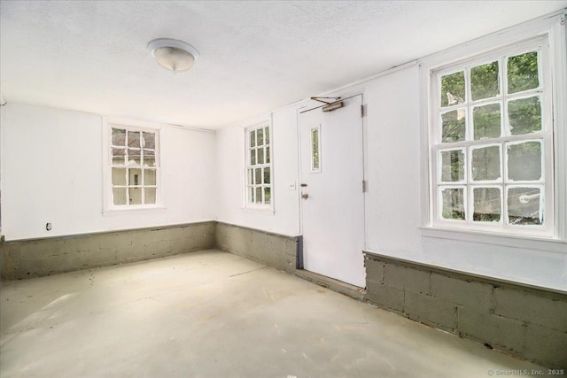 3 Brookside Trl, Monroe, CT 06468 - empty room featuring concrete floors