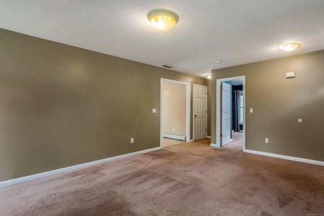 46 Dewey St, Middletown, CT 06457 - unfurnished room with baseboard heating, light carpet, baseboards, and a textured ceiling