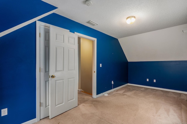 46 Dewey St, Middletown, CT 06457 - bonus room featuring carpet flooring, a textured ceiling, baseboards, and lofted ceiling