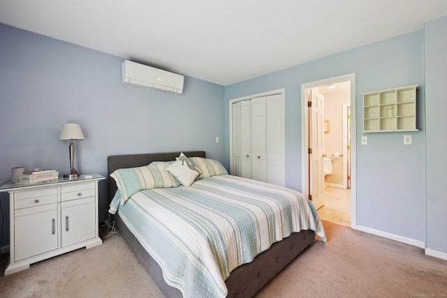 8 Highview Rd, Madison, CT 06443 - bedroom with a wall mounted AC, light carpet, a closet, and connected bathroom