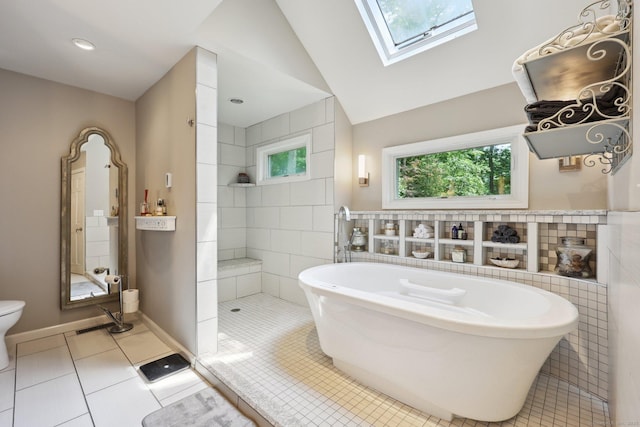 8 Highview Rd, Madison, CT 06443 - bathroom with a freestanding tub, healthy amount of natural light, a skylight, tile patterned flooring, and lofted ceiling