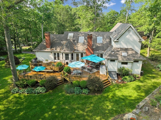 8 Highview Rd, Madison, CT 06443 - rear view of house featuring a chimney, a wooden deck, and a lawn