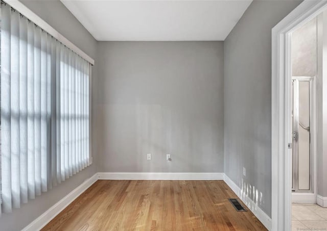 240 Highland Ave, Stratford, CT 06614 - empty room with baseboards and light wood-style floors